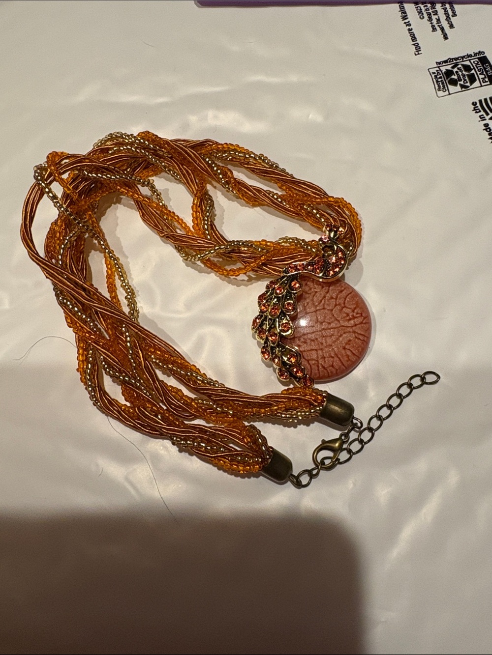 Orange Beaded Multi-Strand Necklace with Decorative Pendant